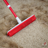 IndigoPet Hair Removal Broom with sturdy handle and brush head, designed for effective pet hair cleanup on floors.